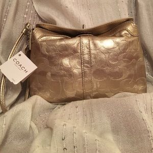 Coach gold wristlet
